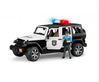 Police Bruder Jeep Wrangler Unlimited Rubicon with Police Figure (02526) Rotaļu auto un modeļi